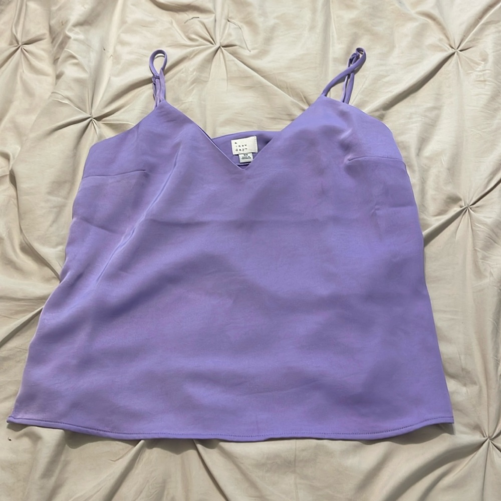 Purple tank top with adjustable straps. Size XS.